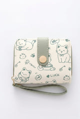 Vespera finurlig japansk-inspireret clutch taske i pastelfarver og med bjørnedesign