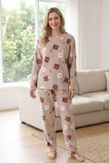 Blonde model wearing the khaki bear-print coral fleece pyjama set